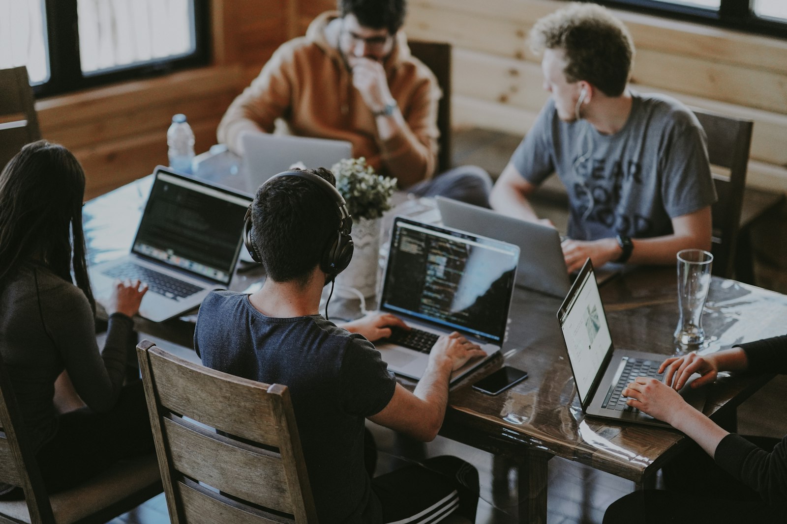 Consultants working together around a table